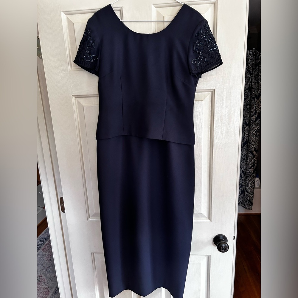 Size 8p navy formal dress in excellent condition from smoke free home.